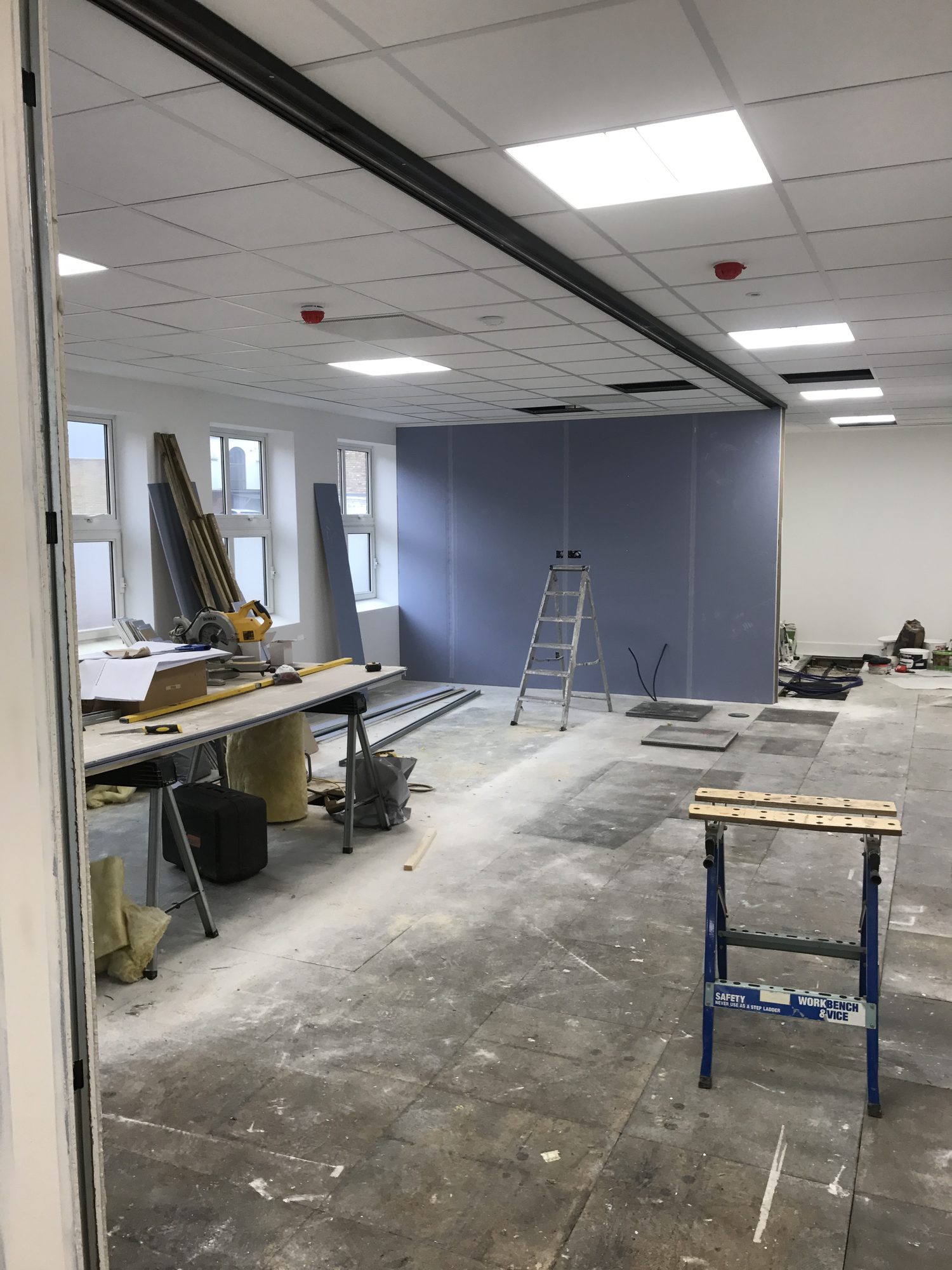 First-fix carpentry with mitre saw on site