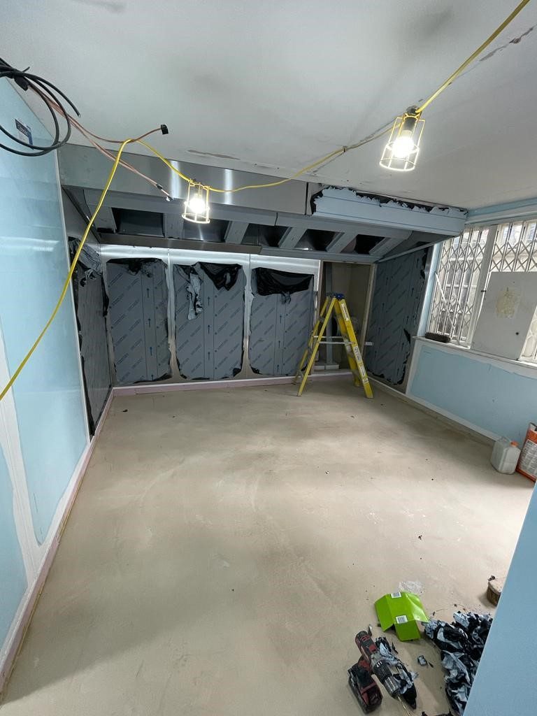 First-fix services and insulation in place under task lighting