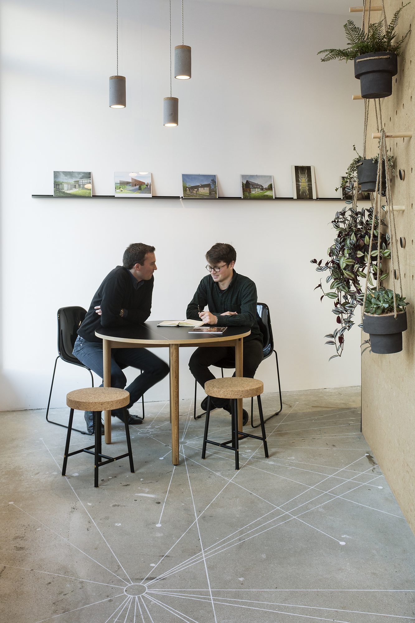 Finished studio. Kitchen, meeting box and signature peg-board wall